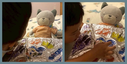 跟貓咪介紹他的小巧思。永真說，這裡有兩隻蝸牛喔！︁